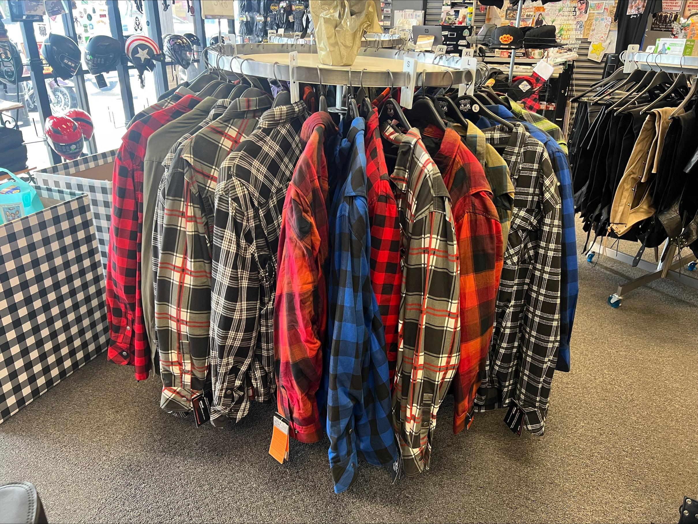 Clothing racks with jackets and shirts