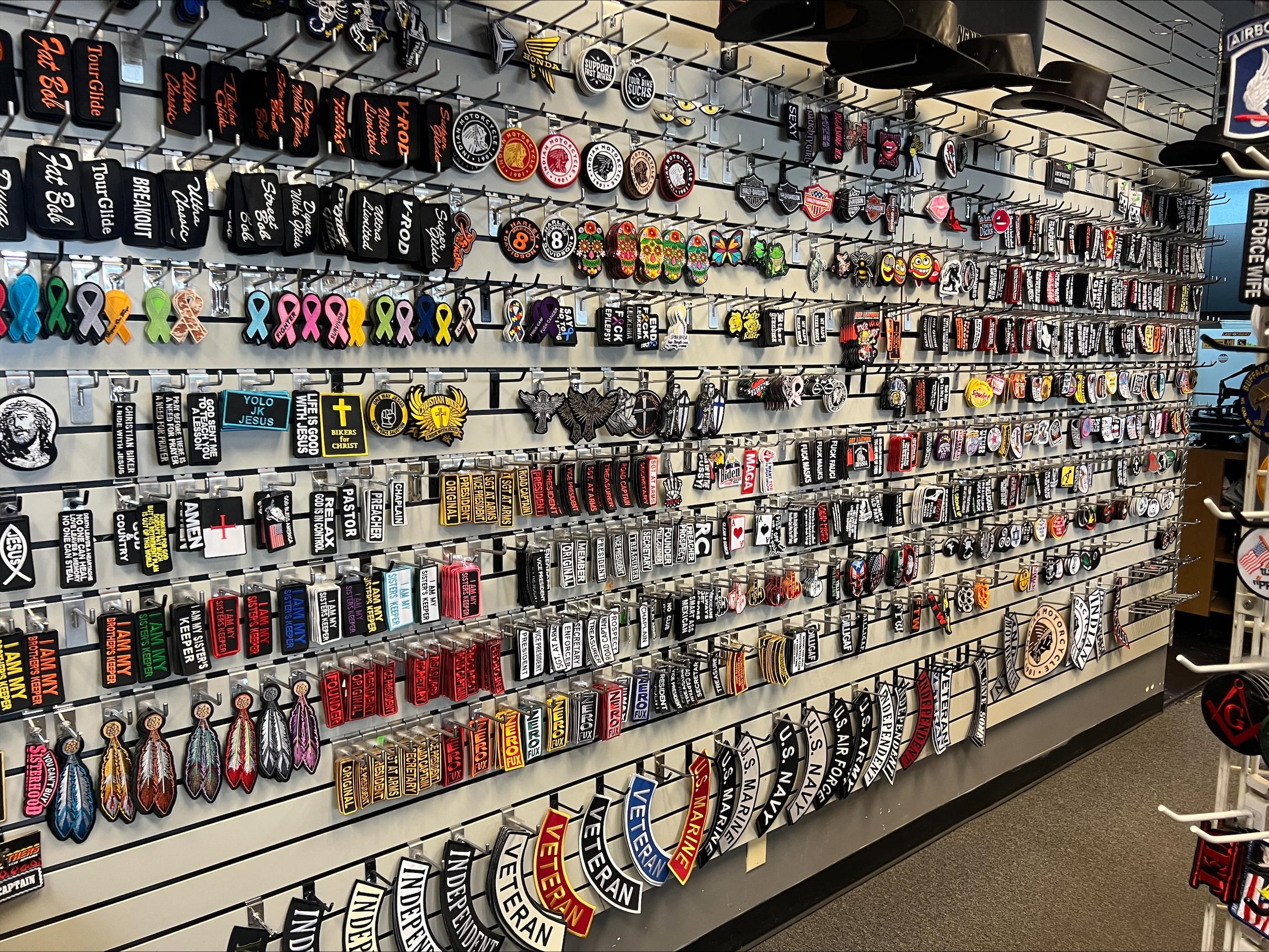 Wall of biker vests and patches at Wilson Biker Gear